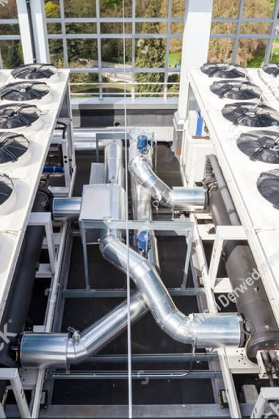 stock-photo-on-an-flat-roof-there-cooling-air-conditioning-644328793